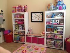 a child's playroom with toys and stuffed animals on the shelves in it