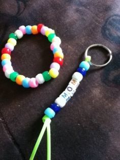 a colorful bracelet with a keychain attached to it