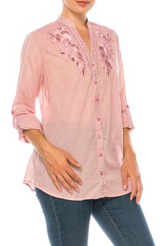 Featured on a solid pink background, this button-down tunic is made from 100% light-weight cotton voile fabric, with exquisite embroidery on the collar, yoke, and the placket. It is also treated with a vintage wash. Model is 5’8” - wearing size small. Model Bust: 34” Hand-wash cold, lay flat to dry.Made in India. Spring Split Neck Blouse With Placket, Pink Blouse With Placket For Spring, Pink Embroidered Button-up Blouse, Pink Floral Embroidered Blouse For Daywear, Pink Blouse With Embroidered Neckline For Spring, Spring Henley Neckline Cotton Blouse, Spring Cotton Blouse With Henley Neckline, Pink Chikankari Embroidery Blouse, Spring Cotton Button-up Tunic