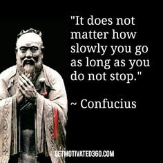 a statue with a quote on it that says, it does not matter how slowly you go as long as you do not stop