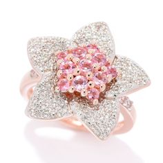 You'll love the captivating color, sparkle and style of this 1.05 carat Jewels by Jorge Pérez flower ring. At the center of the dazzling cluster are 11 pink tourmaline gemstones, which are surrounded by 131 white zircons. It's finely crafted in 18K rose gold vermeil over sterling silver. Pair with matching pendant 205-288 to create a stunning coordinated style. Pink Diamond Cluster Ring With Multi-stone, Pink Cluster Diamond Ring With Center Stone, Pink Cluster Ring With Gemstone, Pink Cluster Gemstone Ring, Pink Cluster Rings With Brilliant Cut, Pink Cluster Diamond Ring Fine Jewelry, Pink Cluster Diamond Ring With Prong Setting, Pink Cluster Diamond Ring, Pink Cluster Ring Fine Jewelry