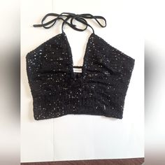 Sexy Black Sequin Halter! Trendy Fitted Halter Top For Night Out, Black Sleeveless Halter Top For Festival, Fitted Sequin Halter Top For Night Out, Chic Black Halter Neck Crop Top, Black Stretch Halter Top For Festivals, Black Halter Crop Top For Festival, Black Halter Neck Top For Festival, Black Halter Neck Crop Top For Evening, Black Crop Top For Festival