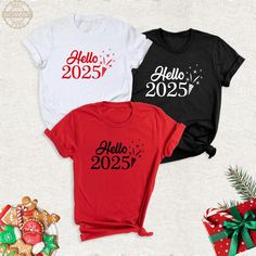 Hello 2025 Family Shirt, Happy New Year Tshirt, 2025 New Year Party Shirt, New Year Holiday Tee, Hello 2025 New Year Group Tee, 2025 Shirts. The most elegant way to welcome the new year! With its modern design and comfortable fit, it is an eye-catching choice for your New Year's celebrations. The perfect piece to make your celebrations more special. Welcome to BestMomentTees! Step into a world of comfort and style with our handmade shirts from the renowned Bella Canvas brand. The solid colors ar New Year White Short Sleeve Tops, White Short Sleeve T-shirt For New Year, White Short Sleeve Top For New Year, Hello 2025, Happy Halloween Pictures, Handmade Shirts, New Years Shirts, New Year Party, New Year Holidays