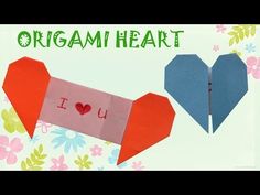 an origami heart with the word i love you written on it and two hearts cut out