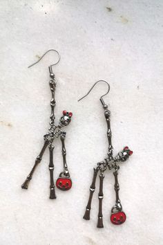 Elegant red bag lady skeleton earrings. Creepy but sweet, scarry but cute, frightening but happy... These earrings make you smile and add C-class horror movie look to your outfit. Check it and test how addictive skeletons earrings might be #skullmakeup #skullart #skullhead #skulljewelry #skullearrings #skulladdict #skulladdiction #earringsforsale #etsyearrings #halloweencostume #halloweenjewelry #halloweenearrings Red Punk Earrings For Gifts, Red Novelty Jewelry For Halloween, Fun Red Jewelry For Halloween, Red Fun Halloween Jewelry, Quirky Red Jewelry For Gifts, Fun Red Halloween Jewelry, Red Earrings As Halloween Gift, Red Earrings For Halloween Gift, Spooky Red Halloween Jewelry