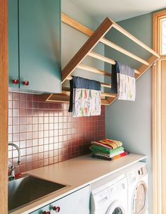 a washer and dryer in a small room