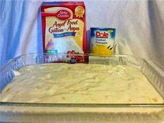 the ingredients for hawaiian delite cake in a glass dish on top of a white tablecloth