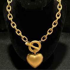 This Givenchy Vintage Brushed Gold Puffy Heart Toggle Necklace With Pearl And Crystal Is A Show Stopper. We Would Almost Say This Necklace Doesn’t Even Need An Outfit! This Is A Marked Givenchy Vintage (Eighties-Ish) Choker Style Necklace. There Are Dazzling Cz’s On The Edges Of The Gold Tone Heart. See Pictures For Condition And Measurement And Don’t Hesitate To Ask. Elegant Metal Toggle Necklace For Valentine's Day, Elegant Heart Pendant Toggle Necklace, Metal Heart Pendant Necklace With Toggle Clasp, Heart Pendant Necklace With Toggle Clasp, Elegant Heart Shaped Toggle Necklace, Elegant Heart Necklace With Toggle Clasp, Valentine's Day Metal Toggle Necklace With Heart Charm, Heart Toggle Necklace, Necklace With Pearl