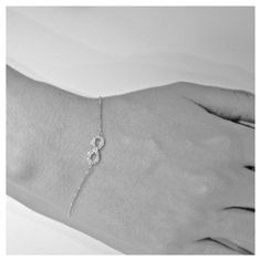 "Infinity refers to something without any limit. Our beautiful diamond Infinity jewelry is the perfect way to celebrate endless love or friendship. This special bracelet is available in your choice of 14k white, yellow, or rose gold! **Diamonds** 25 brilliant, full-cut, round diamonds, total weight 0.15 ct. VS2-SI1 clarity, G-H color **Setting and Chain** 14k gold, total weight 1.7 g 7\" chain adjustable to 7.75\" **Measurements** Be sure to check out our other Infinity items: http://www.etsy.co Diamond Infinity Bracelet For Anniversary, Infinity Diamond Bracelet For Anniversary, Dainty White Gold Infinity Jewelry, Infinity Diamond Bracelet With Accents For Anniversary, Silver Infinity Diamond Bracelet For Anniversary, Elegant Infinity Bracelet With Diamond Accents, Anniversary Infinity Bracelet In Cubic Zirconia, Anniversary Diamond Bracelet With Infinity Design, Elegant Infinity Bracelets With Diamond Accents