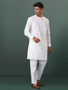 VASTRAMAY Mens White Cotton Embellished Kurta Pyjama Set A blend of tradition and style, this VASTRAMAY kurta pyjama set is crafted from high-quality white cotton, embellished with intricate detailing. Perfect for special occasions or casual gatherings, it offers comfort without compromising on elegance. Features: Intricate embellishments Comfortable cotton fabric Elegant design Suitable for various occasions Specifications: Color: White Material: Cotton Size Options: S, M, L, XL, XXL Material & Traditional Kurta, Kurta Pyjama, Ethnic Looks, Full Sleeves, Pyjama Set, Mandarin Collar, Large White, Intricate Details, Full Sleeve