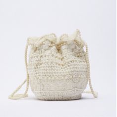 Zara Fabric Mini Bucket Bag New With Tag Fabric Mini Bucket Bag. Top With Embroidered Details. Lined Interior. Handles And Ruched Closure. Height X Length X Width: 7.9 X 7.5 X 4.1 Inches (20 X 19 X 10.5 Cm) Outer Shell Main Fabric: 100% Polyester Embroidery: 100% Cotton Shoulder Strap: 100% Nylon Lining: 100% Polyester Zara Purse, Black Bucket Bag, Zara Handbags, Beige Purses, Fringe Crossbody Bag, Mini Bucket Bag, Snake Skin Bag, Fur Bag, Zara Bags