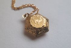 A raw brass hexagon-shaped locket with a star sign picture of your choice on a front is suspended from a raw brass or gold plated chain. * available on chain 20, 22, 24, 26, 28,30,32  inches. * locket measures 3/4 inch * Will arrive in a gift box Golden Locket, Moon Phases Necklace, Image Swag, Gold Locket, Labradorite Necklaces, Jewelry Lookbook, Glass Heart, Fantasy Jewelry