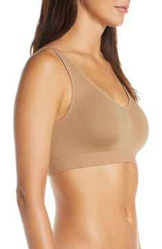 Stay comfy all day in this wireless pullover bra featuring a supportive, no-roll ribbed band and a different color on the reverse for double the ways to wear. Style Name:Spanx Breast Of Both Worlds Reversible Wireless Bra. Style Number: 5841690. Everyday Full Coverage Solid Sports Bra, Everyday Solid Color Full Coverage Sports Bra, Everyday Stretch No-show Sports Bra, Everyday No-show Seamless Bra, Everyday Supportive Seamless Sports Bra, Supportive Seamless Bra For Everyday, Seamless Full Coverage Tops For Loungewear, Basic Seamless Sports Bra With Medium Support, Seamless Full Coverage Loungewear Tops