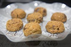 some cookies are sitting on a white plate