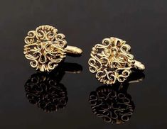 Add a touch of elegance and creativity to your attire with these Fashionable Gold Plated Hollow Floral Design Cufflinks. ' Crafted from high-quality stainless steel and plated with 18k gold, these cufflinks offer a luxurious and durable finish that complements any outfit. Key Features: Material: Made from durable stainless steel and elegantly plated with 18k gold Design: Features a unique hollow floral design that adds a touch of artistic creativity and fashion-forward flair to your look. Handcr Elegant Formal Clip-on Cufflinks, Elegant Gold Cufflinks, Elegant Wedding Cufflinks, Luxury Wedding Cufflinks, Elegant Clip-on Cufflinks For Business, Elegant Rose Gold Cufflinks For Business, Gold Clip-on Cufflinks For Business, Elegant Rose Gold Cufflinks For Wedding, Yellow Gold Round Cufflinks For Wedding