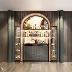 the bar is decorated with many bottles and liquors on shelves, along with an arched doorway