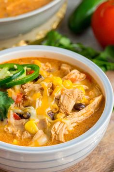 a white bowl filled with chicken tortilla soup