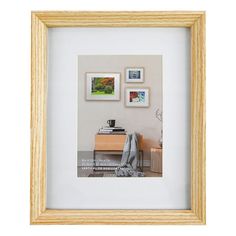 a wooden frame with pictures on the wall