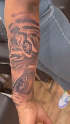 a person with a tattoo on their arm