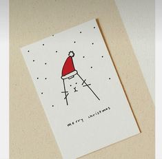 a christmas card with a santa hat on it