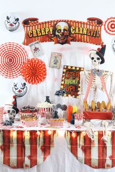 a table topped with lots of food and decorations