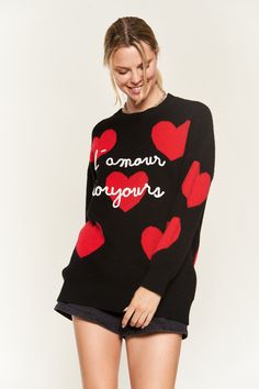 Celebrate romance and warmth with this charming pullover sweater, tailor-made for the essence of Valentine's Day. Crafted entirely from 100% polyester knit, this sweater promises both coziness and durability. Its oversized silhouette, coupled with long sleeves, offers a relaxed and comfortable fit, perfect for those cozy moments. Embracing the spirit of the season, a delightful heart print adorns this sweater, adding a touch of affectionate charm to your attire. This pullover knit sweater embodi Valentines Day Words, Oversized Pullover Sweaters, Pull Oversize, Heart Sweater, Oversized Pullover, Knit Pullover, Sweater Making, Knitted Pullover Sweaters, Printed Sweater