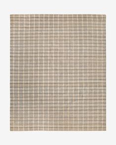 a beige and black checkered rug on a white background, with no people in it