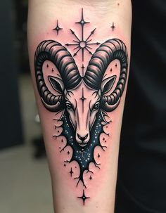 a ram tattoo on the leg with stars