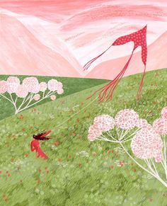 a woman flying a kite over a lush green field filled with pink and white flowers