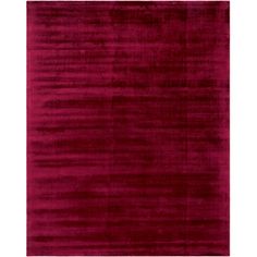 a red rug with an uneven design on the bottom, and a dark purple background