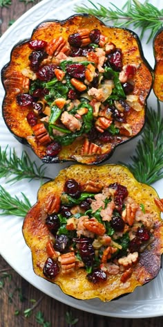 Stuffed Acorn Squash with Sausage, Spinach, Dried Cranberries, and Pecans on a white plate Healthy November Meals, Sausage Apple Stuffed Acorn Squash, Stuff Acorn Squash Recipe, Mediterranean Thanksgiving Recipes, Acorn Squash With Sausage, Acorn Squash Recipes Healthy, Squash With Sausage, Sausage Stuffed Acorn Squash, Julia's Album