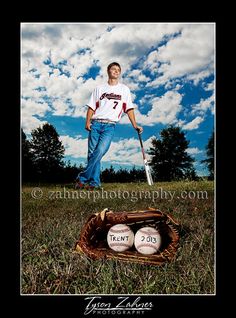 a man holding a baseball bat standing next to two balls in a catchers mitt