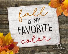 fall is my favorite color sign with autumn leaves around it on a wooden surface and the words, fall is my favorite color