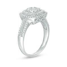 Complete your casual or dressy look with this sophisticated and sparkling cushion-shaped multi-diamond frame ring. Crafted in cool 10K white gold The center diamond composite - centered with a 1/20 ct. diamond - sparkles in two stepped cushion-shaped diamond frames. Along the shank, two ribbons of diamonds lend more drama to the design. This ring shines with 3/8 ct. t.w. of diamonds. Frame Ring, Diamond Frame, Peoples Jewellers, Sparkle Diamonds, Diamond Ring, Drama, Diamonds, White Gold, Sparkle