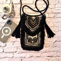 Black embroidered and beaded mobile sling bag Beaded Rectangular Phone Bag For Parties, Rectangular Phone Bag With Cell Phone Pocket For Party, Rectangular Beaded Phone Bag For Parties, Rectangular Phone Bag For Party With Cell Phone Pocket, Party Beaded Rectangular Phone Bag, Rectangular Party Phone Bag With Cell Phone Pocket, Party Rectangular Beaded Phone Bag, Black Rectangular Phone Bag For Party, Rectangular Black Phone Bag For Party