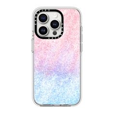 an iphone case with pink, blue and purple glitters on the back cover is shown