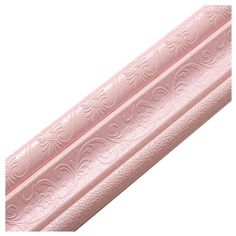 pink paper with intricate designs on it