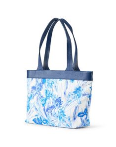 Rani Arabella's signature intricate prints and Italian craftsmanship comes to life in this bag. The small silhouette features a blue and white floral motif and is finished with navy blue leather handles for a luxurious finish. Wear it with a monochromatic outfit for a modern sophisticated look. Luxury Blue Shoulder Bag For The Beach, Affordable Traditional Blue Bag, Valentines Frames, Skirt And Top Dress, Monochromatic Outfit, Work Accessories, Italian Craftsmanship, Blue And White Floral, City Prints