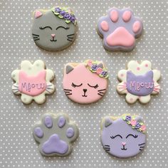 six decorated cookies with different designs on them