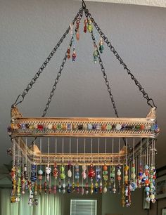 a chandelier hanging from the ceiling in a living room