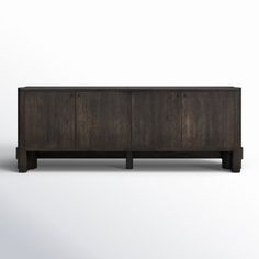 the sideboard is made from dark wood