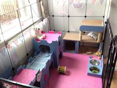 a doll house with furniture and accessories on the floor