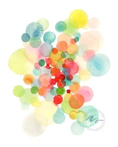 a bunch of colorful balloons floating in the air