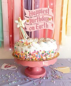 a birthday cake sitting on top of a table