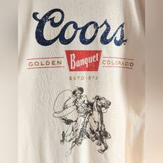 Coors Banquet Beer T-Shirt Featuring A Cowboy With Lasso & Horse Pencil Drawing. Intentionally Distressed For A Vintage Vibe. Text Reads "Coors Banquet" "Golden Colorado" "Est 1873". A Simple, Pleasant Design On A Delightfully Oatmeal-Colored Shirt. Official Coors Licensed Product Printed On A Quality Teeluv Shirt. 100% Cotton. New With Tag. American Golden Mountains Lager Alcohol Usa Co U.S.A. U.S. United States Of America Alcoholic Bar Beverage Golden Colorado Bar Drinking Games Pbr College Po Vintage Horse Shirt, Coors Light Aesthetic, Turtle Island Indigenous, Vibe Text, Cowboy With Lasso, Coors Cowboy, Horse Pencil Drawing, Coors Banquet, Golden Colorado