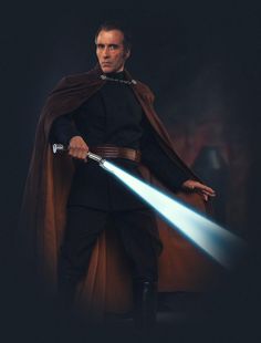 a star wars character holding two lightsabes