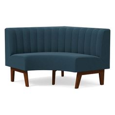 a blue couch sitting on top of a wooden frame