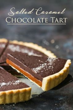 salted caramel chocolate tart on a table with text overlay that reads salted caramel chocolate tart