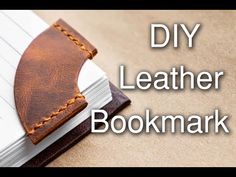 a leather bookmark with the words diy leather bookmark