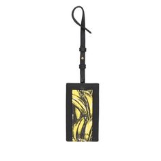 This sophisticated Banana Printed Saffiano leather name tag with the iconic Prada motif is part of the My Character Collection. It can be customizable with My Character elements. This is typically used as a luggage tag but it can also be used as a an I.D. holder. My Character Collection 1EN023 Giallo Dis Banana/Banana Print 4" Black Strap Black/Yellow Dimensions: 4"x.3"x2.3"(LWH) Made in Italy Includes Authenticity Card and Prada box Gender: female.  Age Group: adult. Name Tag Keychain, Banana Print, My Character, Character Collection, Gold Ounce, Name Tags, Key Card Holder, Name Tag, Luggage Tag